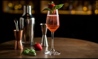 Our Strawberry Fields Forever Cocktail spikes a classic combination of gin and tonic with fresh strawberry syrup.